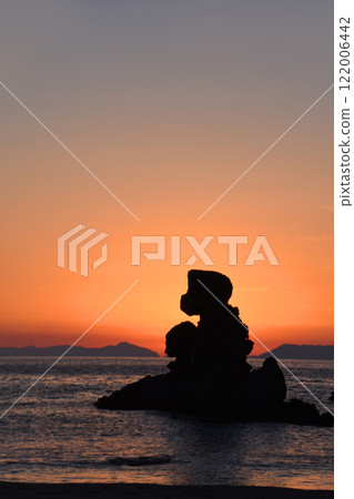 Ningyo-iwa Rock and a beautiful gradation evening view on the west coast of Kagoshima Prefecture 122006442