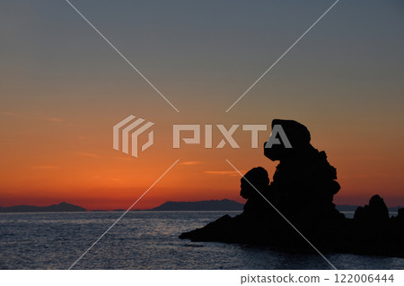 Ningyo-iwa Rock and a beautiful gradation evening view on the west coast of Kagoshima Prefecture 122006444