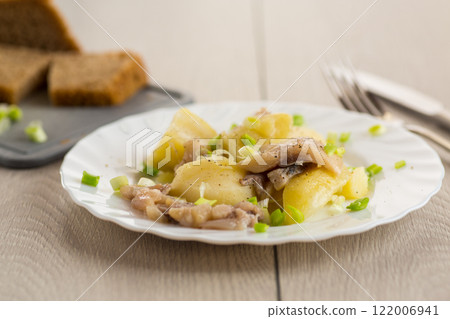 Potatoes and herring with green onions 122006941