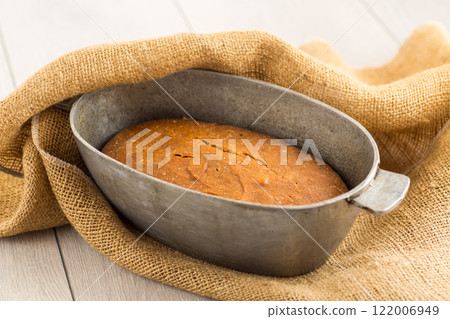 Fresh Bread on a Wooden Board 122006949