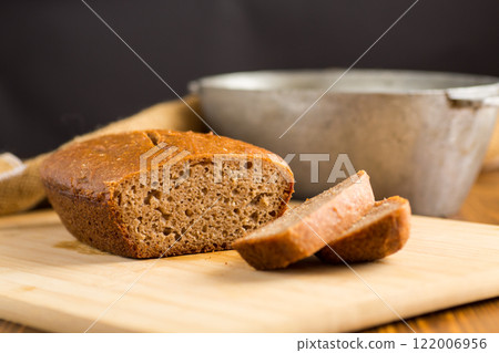 Fresh Bread on a Wooden Board Fresh Bread on a Wooden Board 122006956