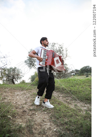 Music Sounds From Accordion In The Green Field Music Sounds From Accordion In The Green Field 122007194