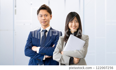 Image of business teamwork between two men and women 122007256