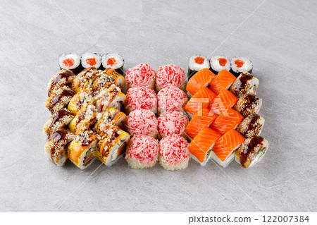 Japanese sushi rolls, sushi sets on a gray background for restaurant menu and food delivery 122007384