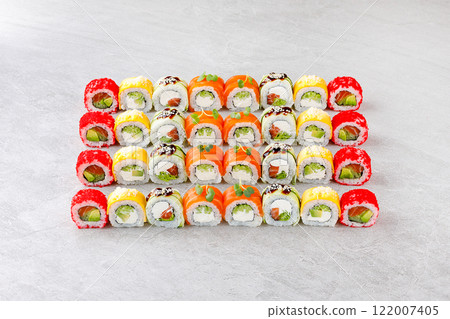 Japanese sushi rolls, sushi sets on a gray background for restaurant menu and food delivery 122007405