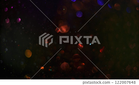 Holiday abstract bokeh on black background. Festive sparkling gold dust. Holiday concept 122007648