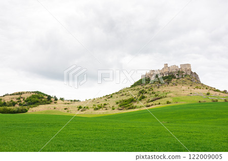 spis castle on the hill in spring. popular travel destination of slovakia. overcast sky 122009005