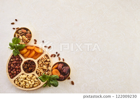 Concept of the Jewish holiday Tu Bishvat. Dried Fruits and Nuts Arrangement. Concept of the Jewish holiday Tu Bishvat. Dried Fruits and Nuts Arrangement. 122009230