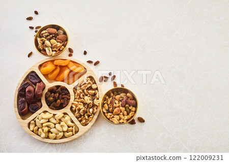 Concept of the Jewish holiday Tu Bishvat. Dried Fruits and Nuts Arrangement. Concept of the Jewish holiday Tu Bishvat. Dried Fruits and Nuts Arrangement. 122009231