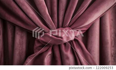 Velvet curtain tied in knot, rich texture and color. Interior decor and luxury design concept 122009253