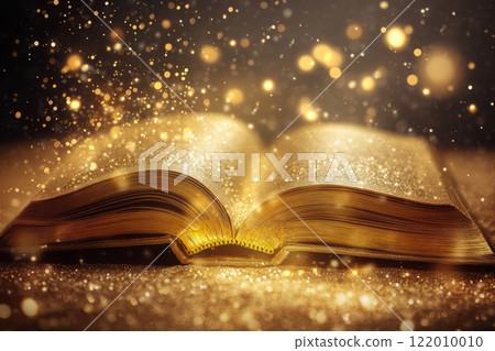 Magical golden book glowing with energy 122010010