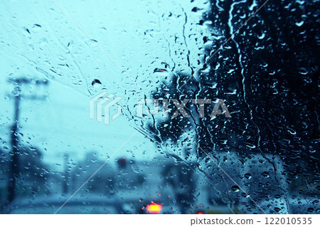 Car window glass on a rainy day Car window glass on a rainy day 122010535