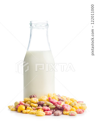 Colorful breakfast cereals in the shape of various fruit and milk isolated on white background. 122011000