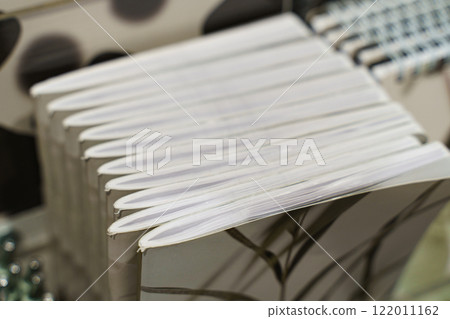 Beautifully arranged notebooks on display at a charming stationery shop Beautifully arranged notebooks on display at a charming stationery shop 122011162