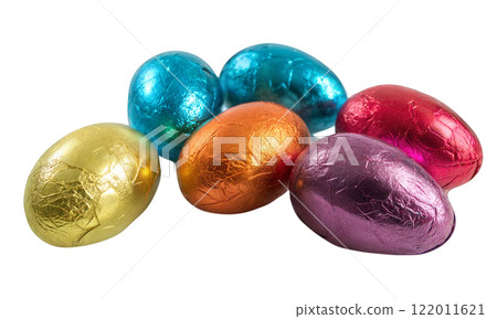 Colorful chocolate eggs wrapped in foil on a white background 122011621