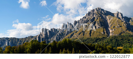 Panoramic view of Grignetta mountain near Belvedere del Parco Valentino at Piani Resinelli Panoramic view of Grignetta mountain near Belvedere del Parco Valentino at Piani Resinelli 122012877