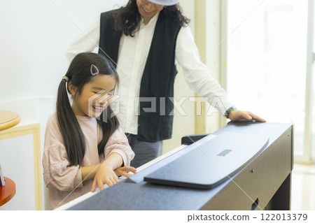 Piano lesson image Piano lesson image 122013379