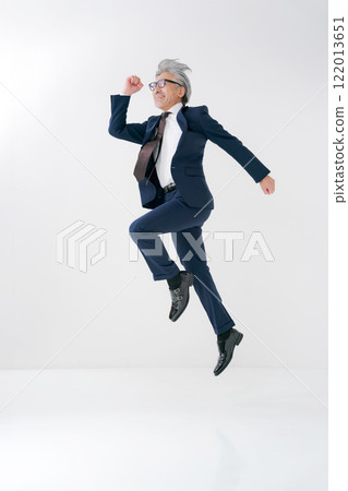 Portrait of a jumping senior man Portrait of a jumping senior man 122013651
