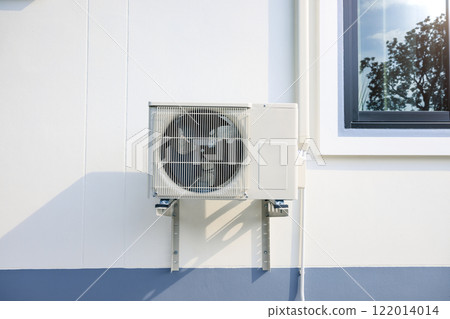 Condenser unit outside home. 122014014