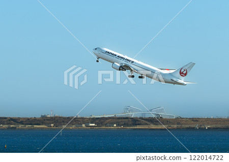 Jet passenger plane taking off from Haneda Airport 122014722