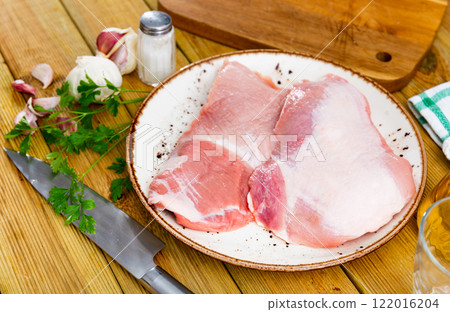Fresh raw pork secreto steak and spices prepared for cooking Fresh raw pork secreto steak and spices prepared for cooking 122016204