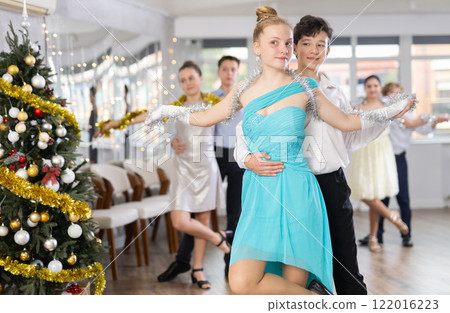Boy and girl dancing ballroom dance in studio 122016223