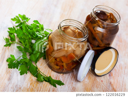 Close-up of delicious marinated mushrooms assorted Close-up of delicious marinated mushrooms assorted 122016229