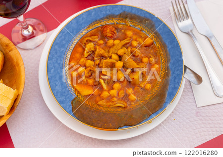 Nice plate of callos a la catalana served with chickpeas and chorizo Nice plate of callos a la catalana served with chickpeas and chorizo 122016280