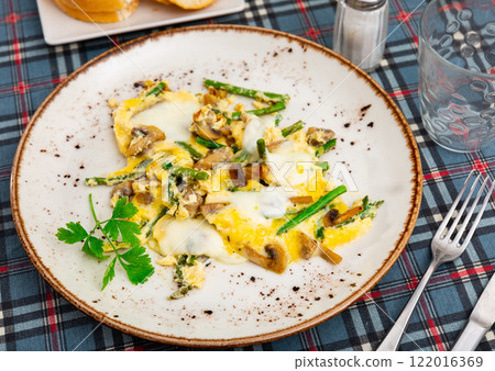 Scrambled eggs with mushrooms and asparagus 122016369