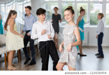Boy and girl dancing twist in studio Boy and girl dancing twist in studio 122016454