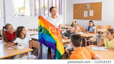 Teacher explaining lesson about LGBTQ people to pupils 122016593