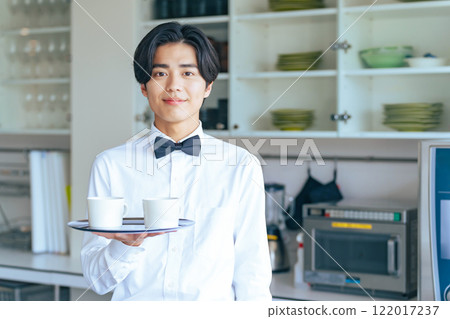 Restaurant clerk holding a coffee cup Barista Waiter 122017237