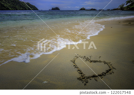 View of the sea from the beach of Coconut Island Kilian Bay View of the sea from the beach of Coconut Island Kilian Bay 122017548