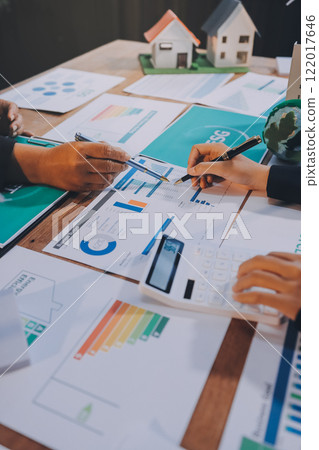 Carbon offset price report CO2 emission. Future growth Net zero waste in ESG ethical SME office protect climate change global warming social issues project. Group of asia people Eco friendly SDGs plan Carbon offset price report CO2 emission. Future growth Net zero waste in ESG ethical SME office protect climate change global warming social issues project. Group of asia people Eco friendly SDGs plan 122017646