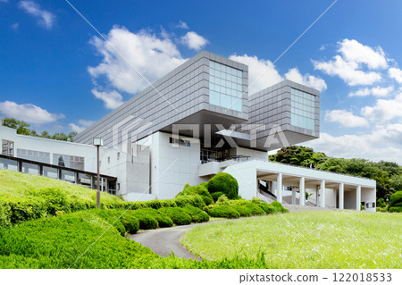 Kitakyushu Municipal Museum of Art on a clear day, surrounded by fresh greenery 122018533