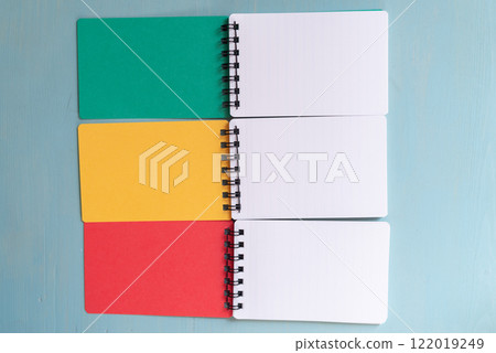 Colorful notepads lined up Colorful notepads lined up 122019249