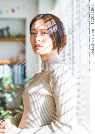 Portrait of a woman taken indoors Portrait of a woman taken indoors 122021868