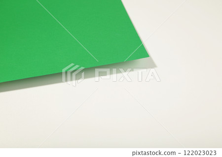 Green and white paper texture background with shadow, copy space. Green and white paper texture background with shadow, copy space. 122023023