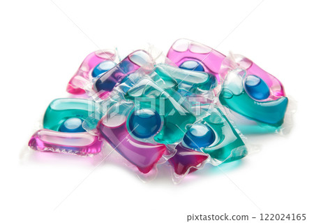 Capsule for washing isolated on white background. Spring clothes cleaning. Capsule for washing isolated on white background. Spring clothes cleaning. 122024165