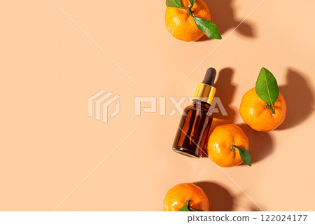 Serum bottle or orange citrus fruit essential oil 122024177