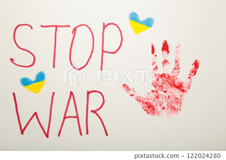 Inscription Stop war with baby handprint on white background, conflict between Ukraine and Russia. No war, stop war, russian aggression. Ukrainian patriot. 122024280