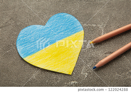 Heart pattern, yellow-blue flag of Ukraine. revention of hostilities in Ukraine. Peace concept. No war, stop war, russian aggression. 122024288
