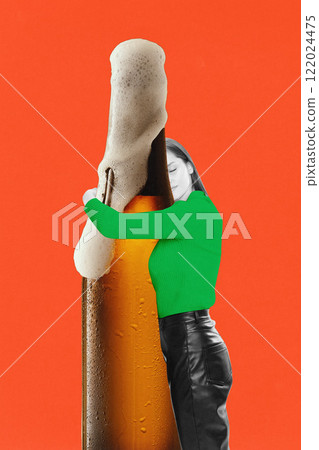 Woman wearing green long-sleeve sweater embracing giant beer bottle with foam dripping down against bold orange background. Creative art collage 122024475