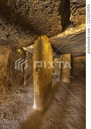 Interior of the Menga dolmen, view of the central pillar, UNESCO site, Antequera, Spain Interior of the Menga dolmen, view of the central pillar, UNESCO site, Antequera, Spain 122024954