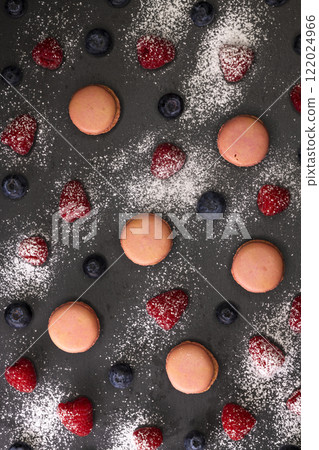 macaroons of different colors on a black background macaroons of different colors on a black background 122024966