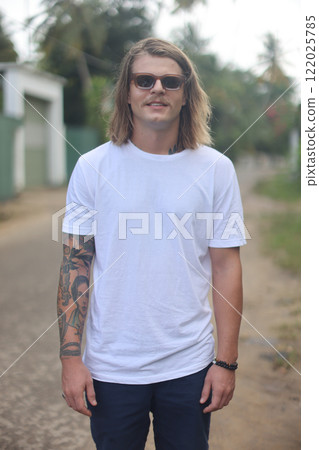 Embracing the carefree summer vibes in a stunning, beautiful tropical paradise by the beach 122025785