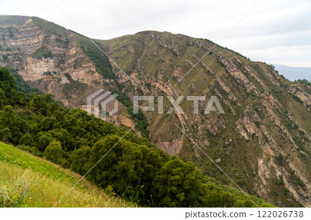 Caucasian mountain Dagestan. Trees, rocks, mountains, view of the green mountains. Beautiful summer landscape. Caucasian mountain Dagestan. Trees, rocks, mountains, view of the green mountains. Beautiful summer landscape. 122026738