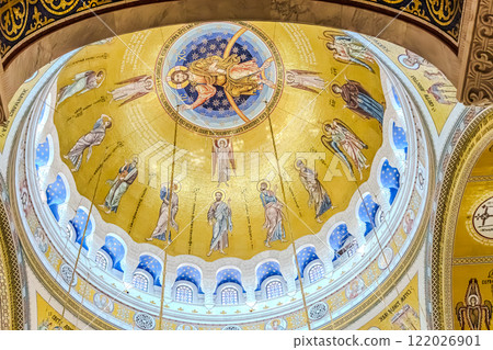 Belgrade, Serbia- 10162024: The Temple Of Saint Sava indoor interior, people pray in an Orthodox church, frescoes on the ceilings and walls of the church. High quality photo 122026901