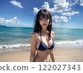 The upper body of a woman in a swimsuit standing on a sandy beach on a sunny day 122027343