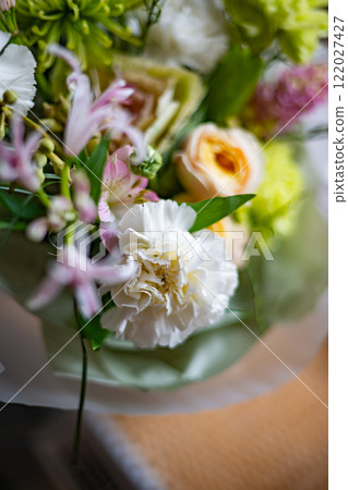 Vibrant Floral Arrangement Featuring a Variety of Colorful Blooms Vibrant Floral Arrangement Featuring a Variety of Colorful Blooms 122027427